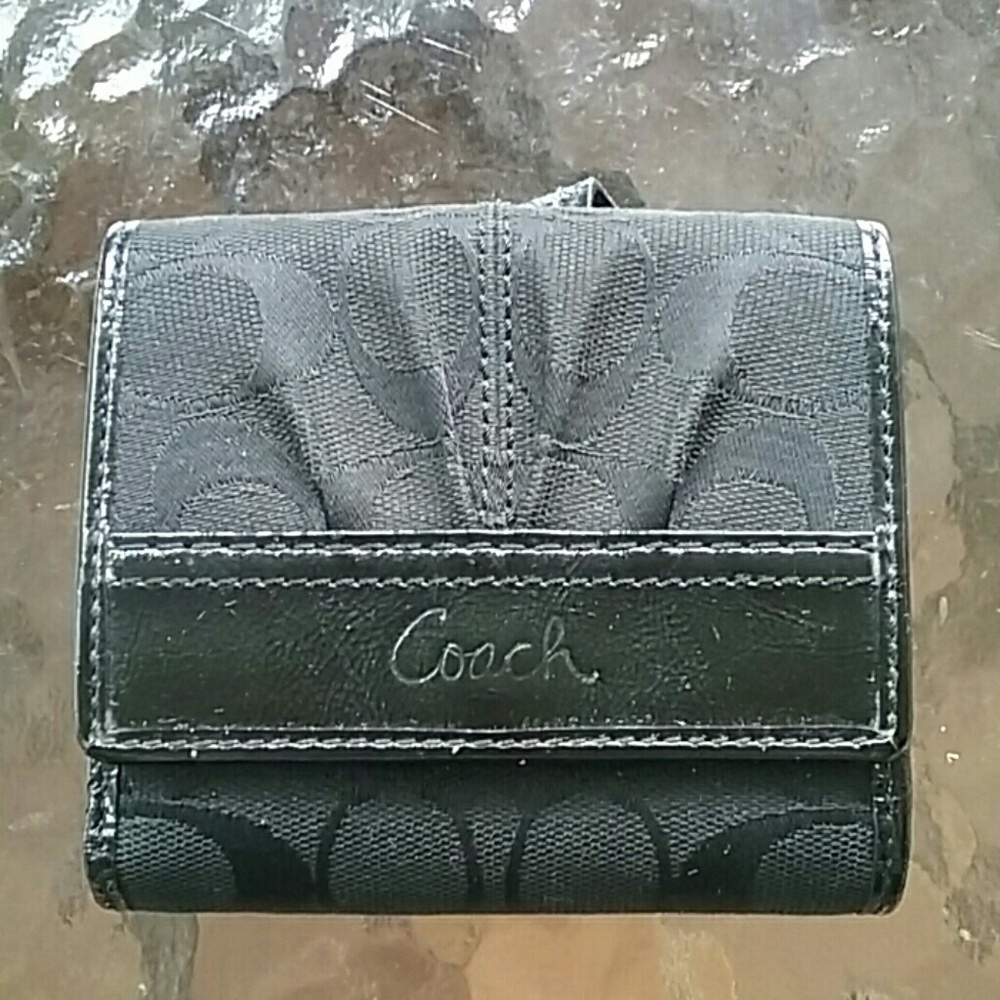 Dark gray and black Coach wallet